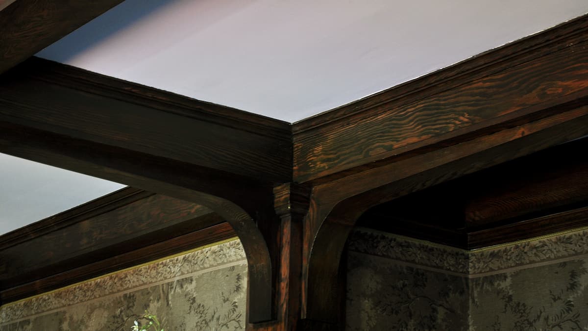 A detail of the living room at Lochkelden in Seattle, Washington, showing panelling and furnishings